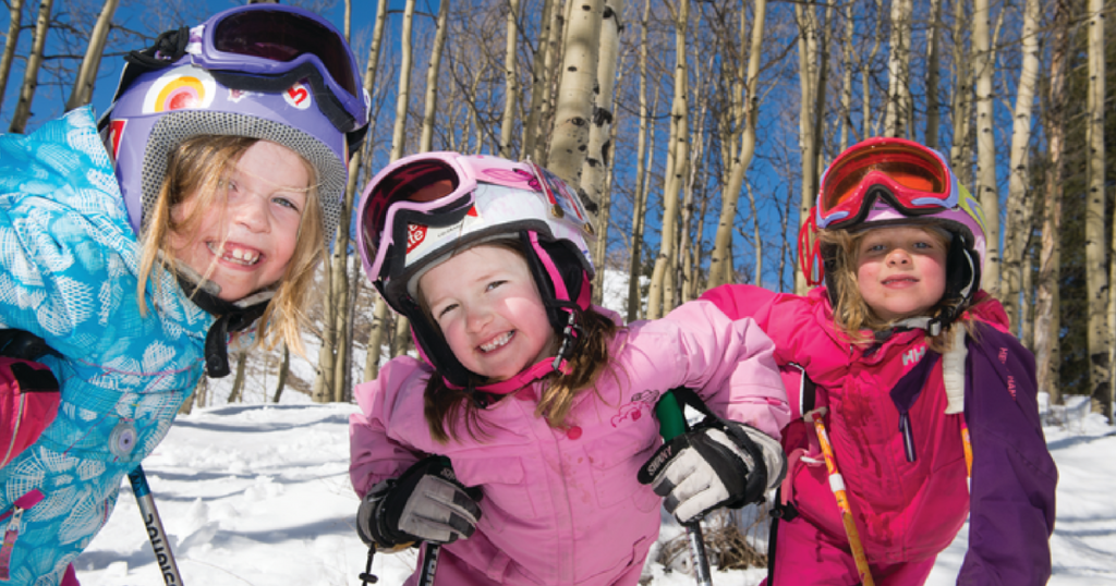 Three girls in ski gear at Crested Butte.
