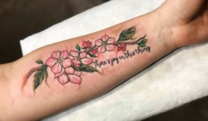 There's joy in this thing crab apple branch with blooms tattoo